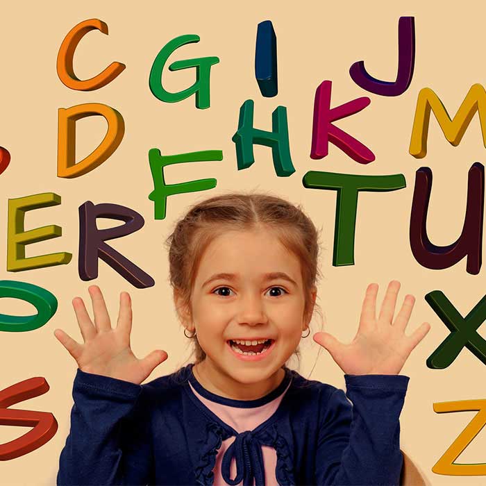 A teacher welcoming a child to the centre